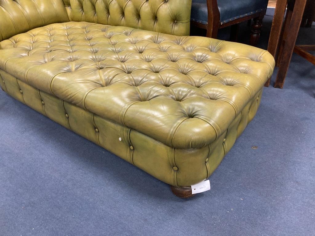 A Victorian style daybed upholstered in buttoned green leather, length 170cm, width 70cm, height 82cm